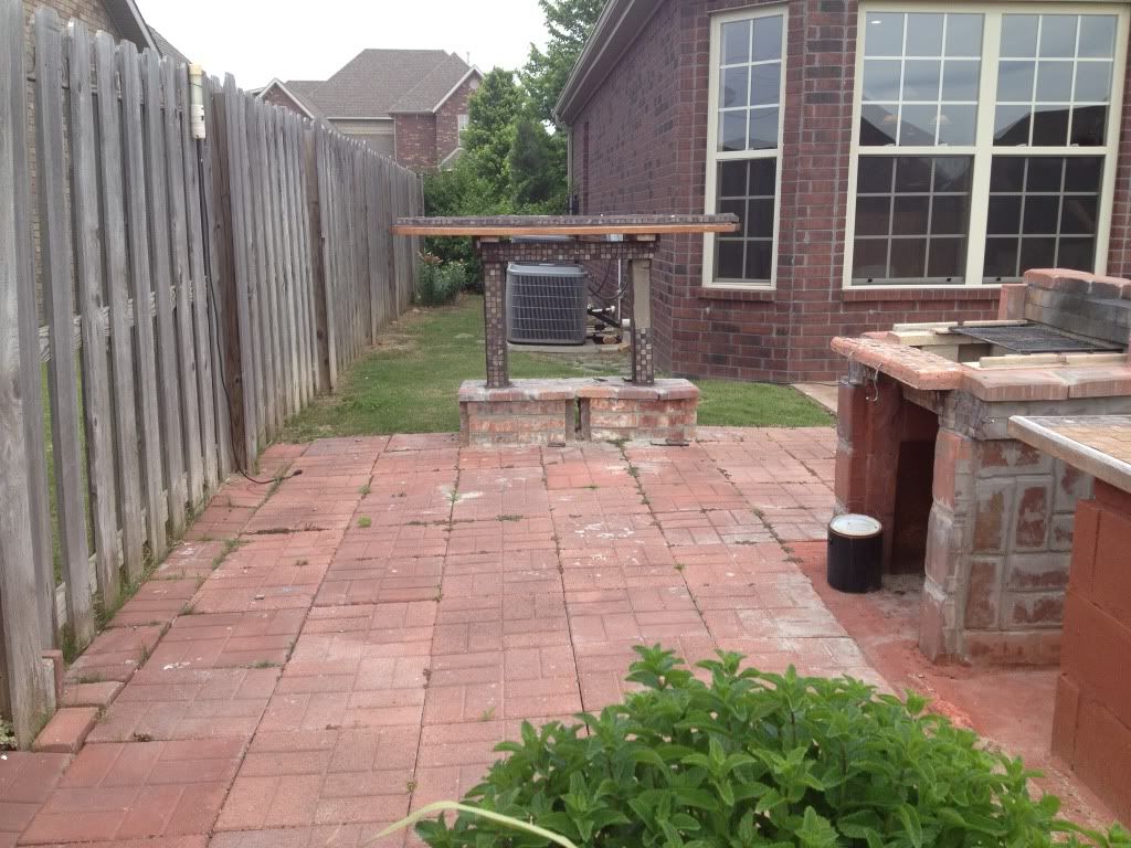 Best way to remove brick patio monstrosity?